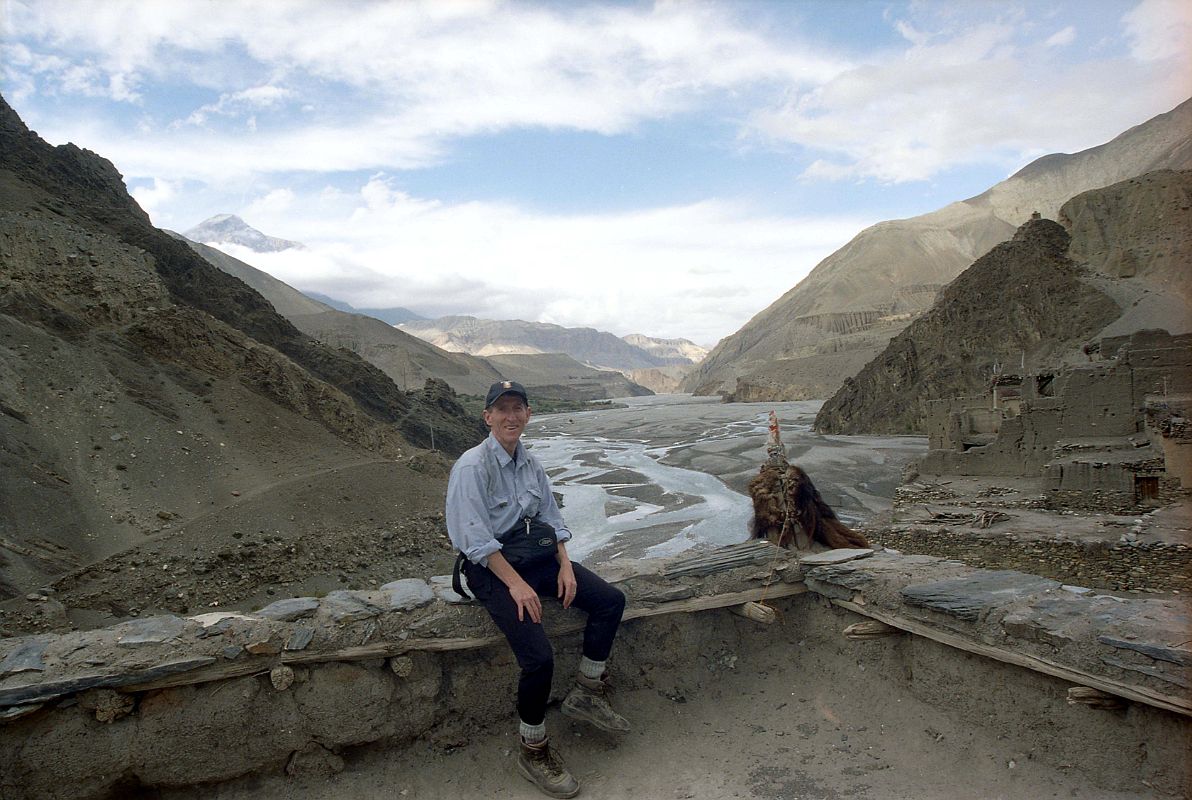 212 Jerome Ryan On Kagbeni Gompa Roof With View Towards Upper Mustang I went to the roof of the Kagbeni gompa and admired the view of the entrance to upper Mustang. Although it may look serene, the afternoon wind actually bowled me over on the rood. Be careful.